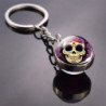 Magnifiqeu Porte-clés boule transparente effet retro : 12 modèles de Santa Muerte