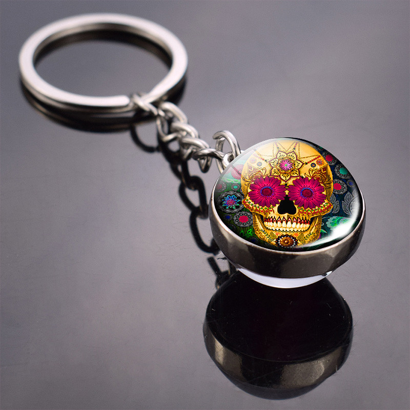 Porte-clés boule transparente effet retro : 12 modèles de Santa Muerte