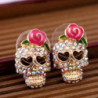 Détails Boucles d'oreilles tête de mort Skull Rose et Strass