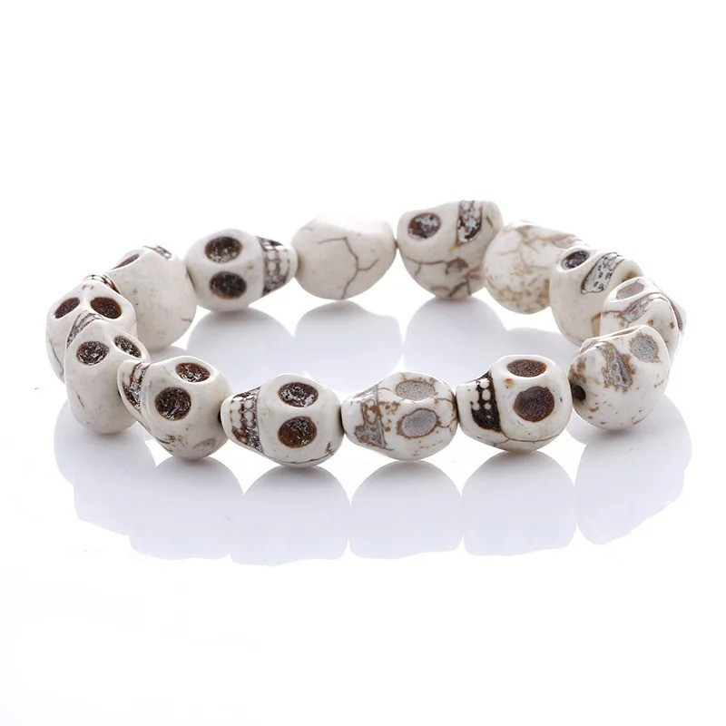Bracelet Tête de Mort Crânes multiples en pierre naturelle - couleur blanc