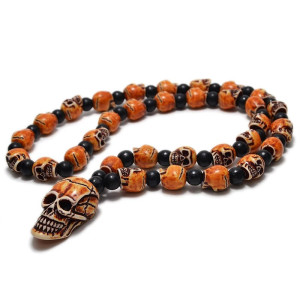 Collier Tête de Mort Tribal "Crânes Ancestraux d’Ébène" Couleur Orange