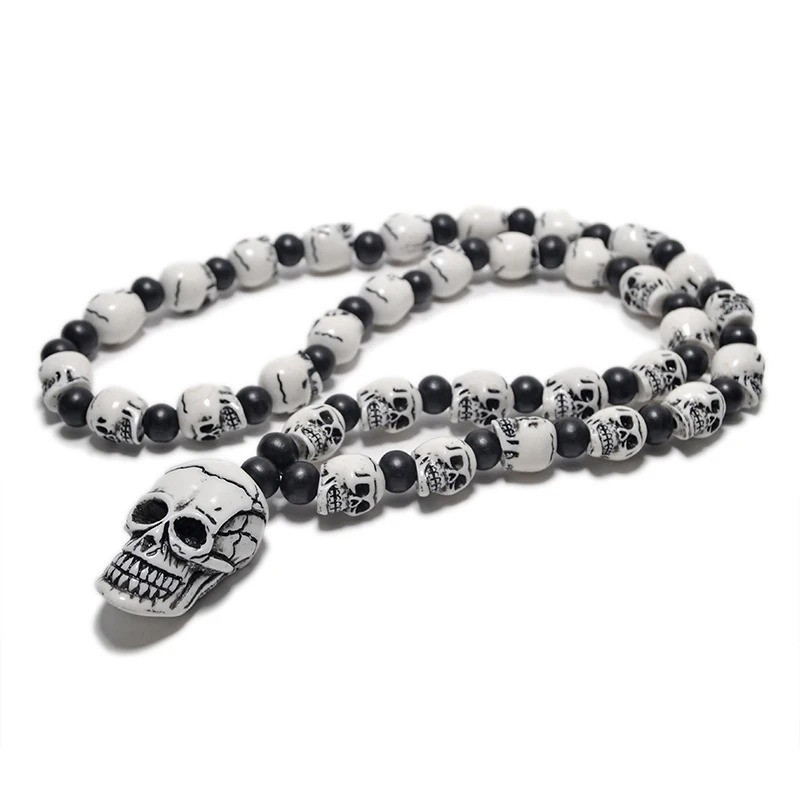 Collier Tête de Mort "Chapelet de Crânes Tribaux" Couleur Noir et Blanc