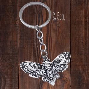 Dimensions Porte-Clés Tête de Mort "Papillon de l’Au-Delà"